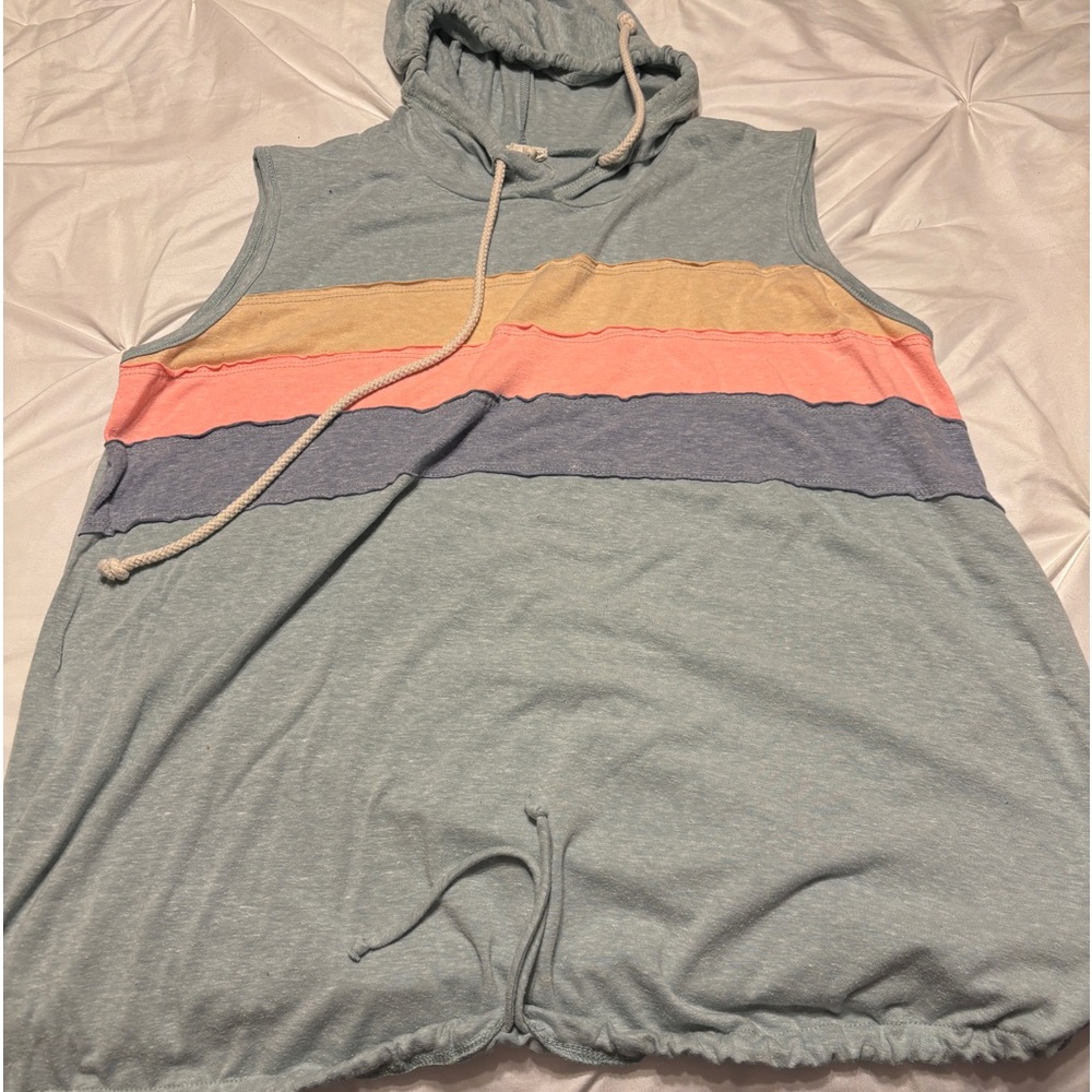 One really cute shirt for the summer. Great condition.